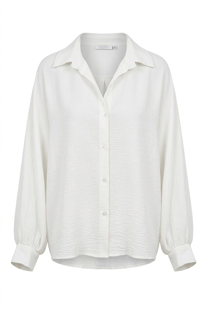 Witte blouse op witte achtergrond met grijze schaduw